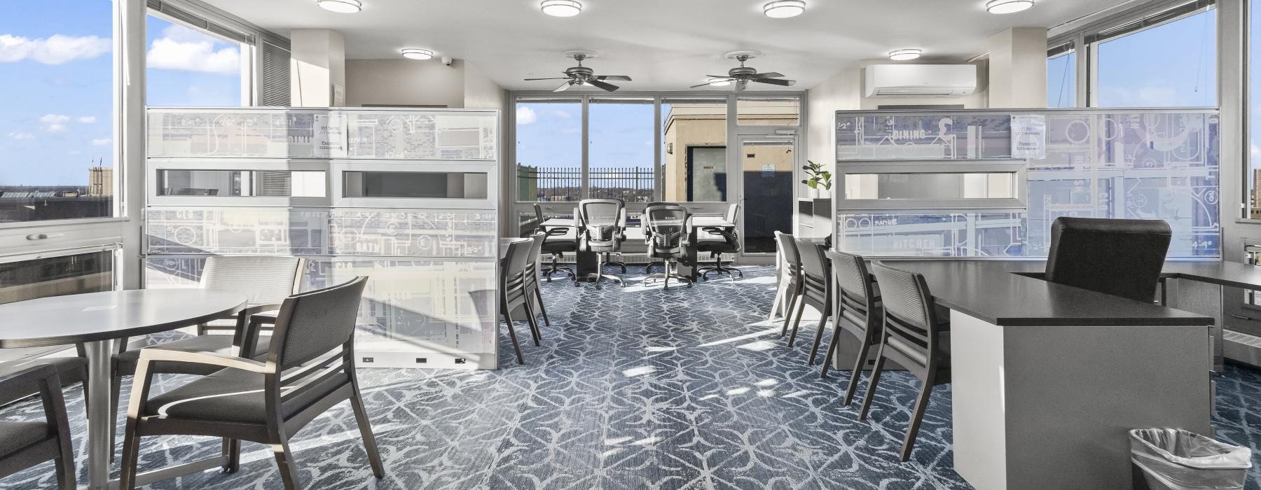 a room with tables and chairs